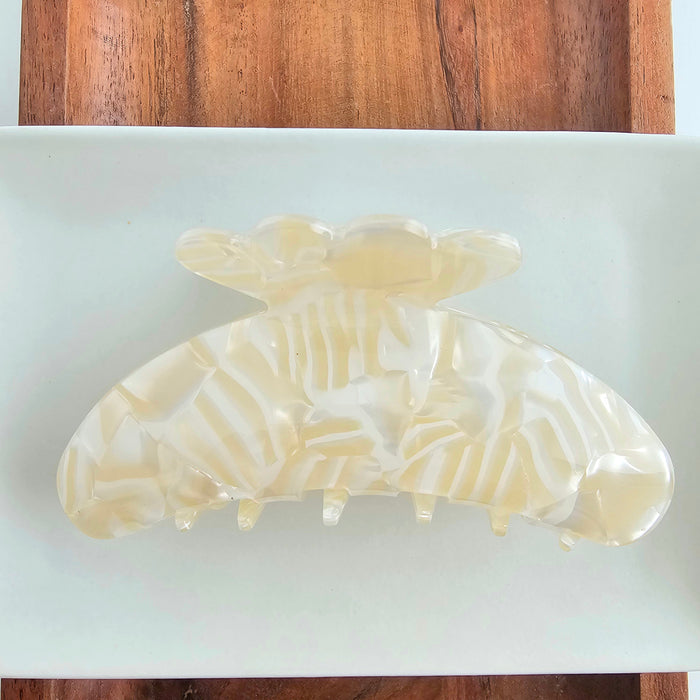 Ivory Brielle Hair Claw by Spiffy & Splendid, a stylish hair accessory with a sleek claw design for secure styling.